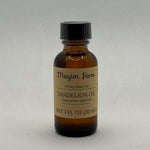 Dandelion Hemp Seed Oil, 1 fl oz amber glass bottle, herbal body oil made at Mayim Farm in Opp, Alabama