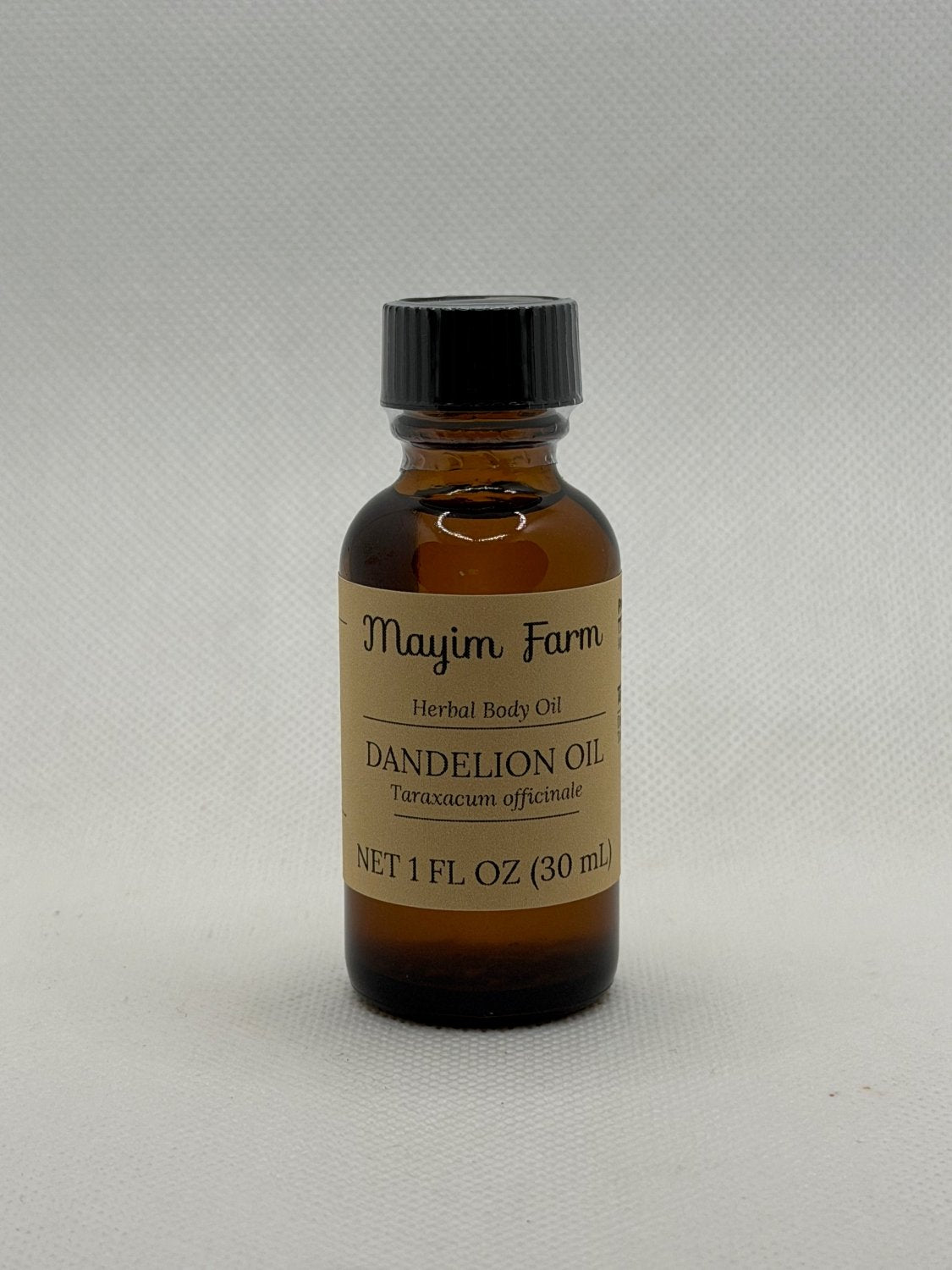 Dandelion Hemp Seed Oil, 1 fl oz amber glass bottle, herbal body oil made at Mayim Farm in Opp, Alabama