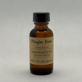 Dandelion Hemp Seed Oil, 1 fl oz amber glass bottle, herbal body oil made at Mayim Farm in Opp, Alabama