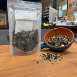 Elderberry Syrup Kit in a pouch with dried elderberries, cinnamon sticks and whole spices, packed by hand at Mayim Farm in Opp, Alabama