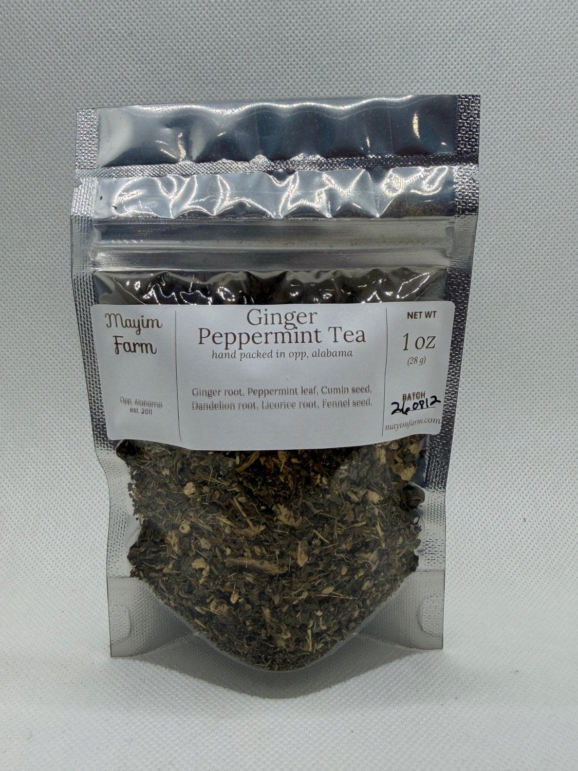 Ginger Peppermint Tea bag front, a loose leaf ginger and peppermint blend packed by hand in Opp, Alabama