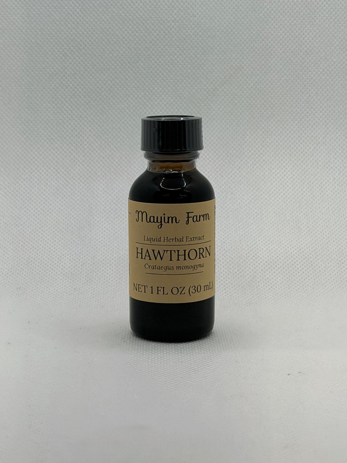 Hawthorn Berry Extract, 1 fl oz amber glass bottle, liquid herbal extract made at Mayim Farm in Opp, Alabama