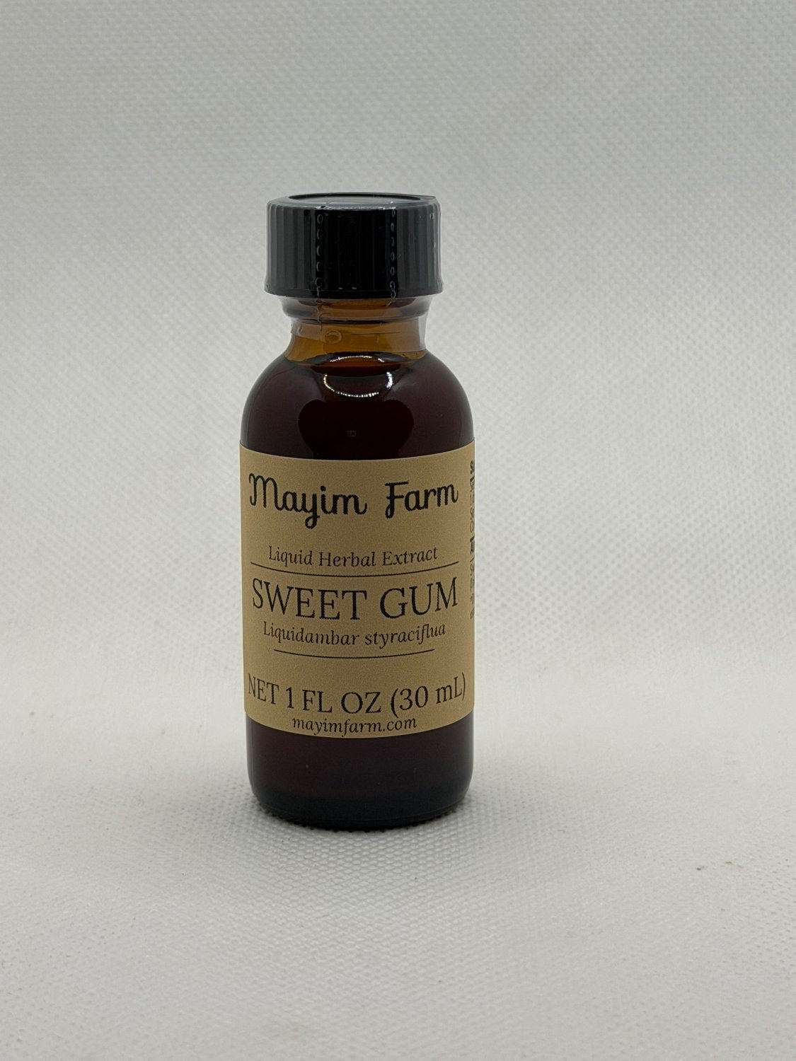 Sweet Gum Ball Extract, 1 fl oz amber glass bottle, liquid herbal extract made at Mayim Farm in Opp, Alabama