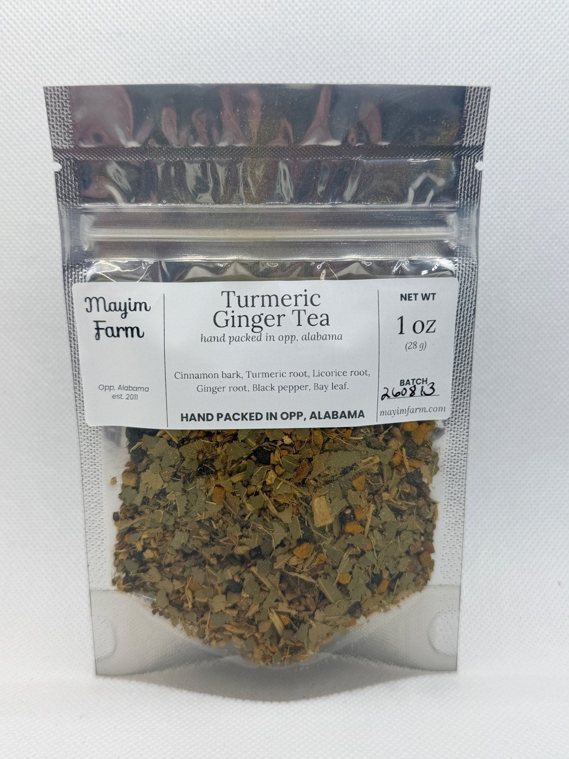 Turmeric Ginger Tea bag front, a loose leaf turmeric and ginger blend packed by hand in Opp, Alabama