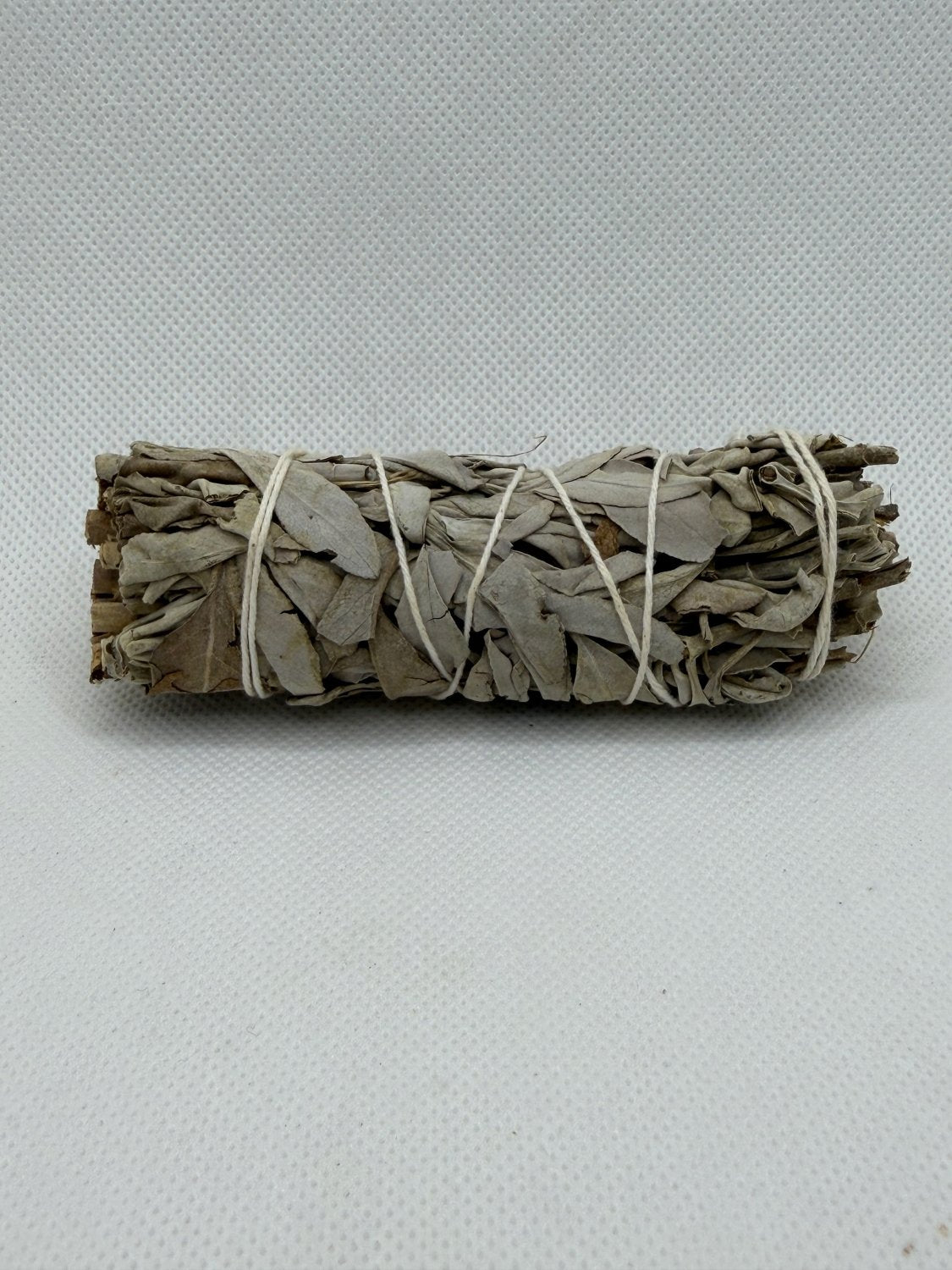 White sage smudge sticks front of the package, ethically sourced and sold by Mayim Farm