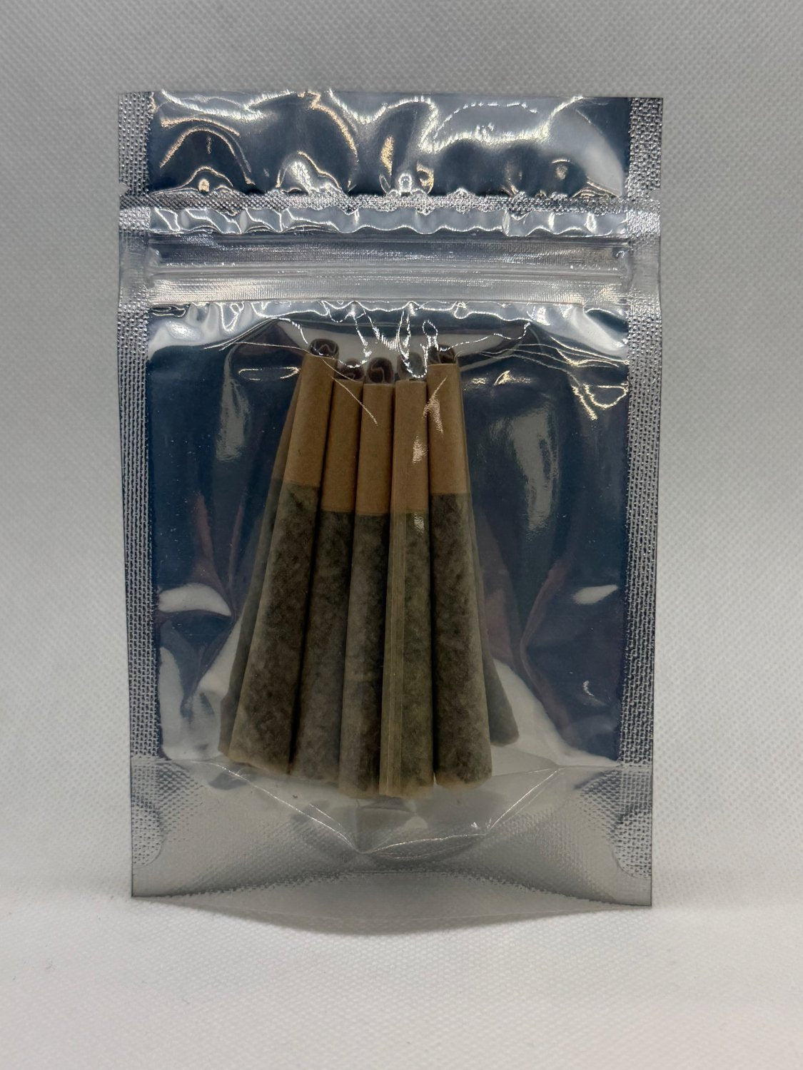 Five Mayim Farm Wildcrafted Mullein Prerolls in a clear bag, pure mullein leaf in unbleached paper